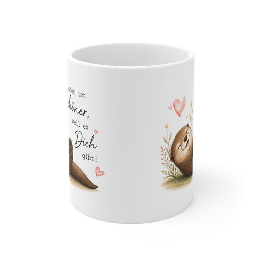 Rundum bedruckte Keramiktasse mit seitlich sichtbarem Ottermotiv, Herzdetails und romantischem Schriftzug