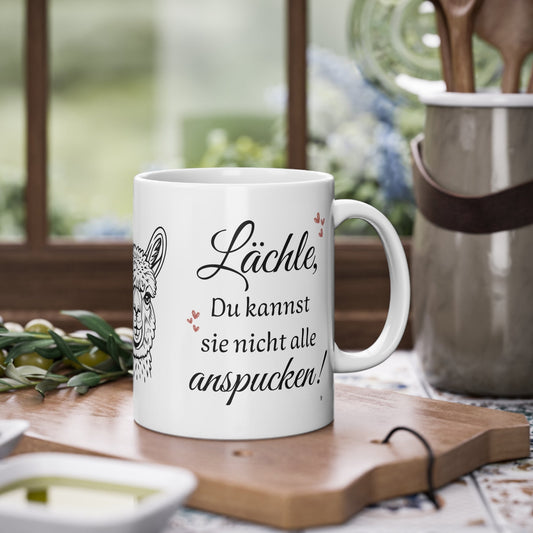 Weiße Tasse mit Alpaka Motiv und lustigem Spruch du kannst sie nicht alle anspucken