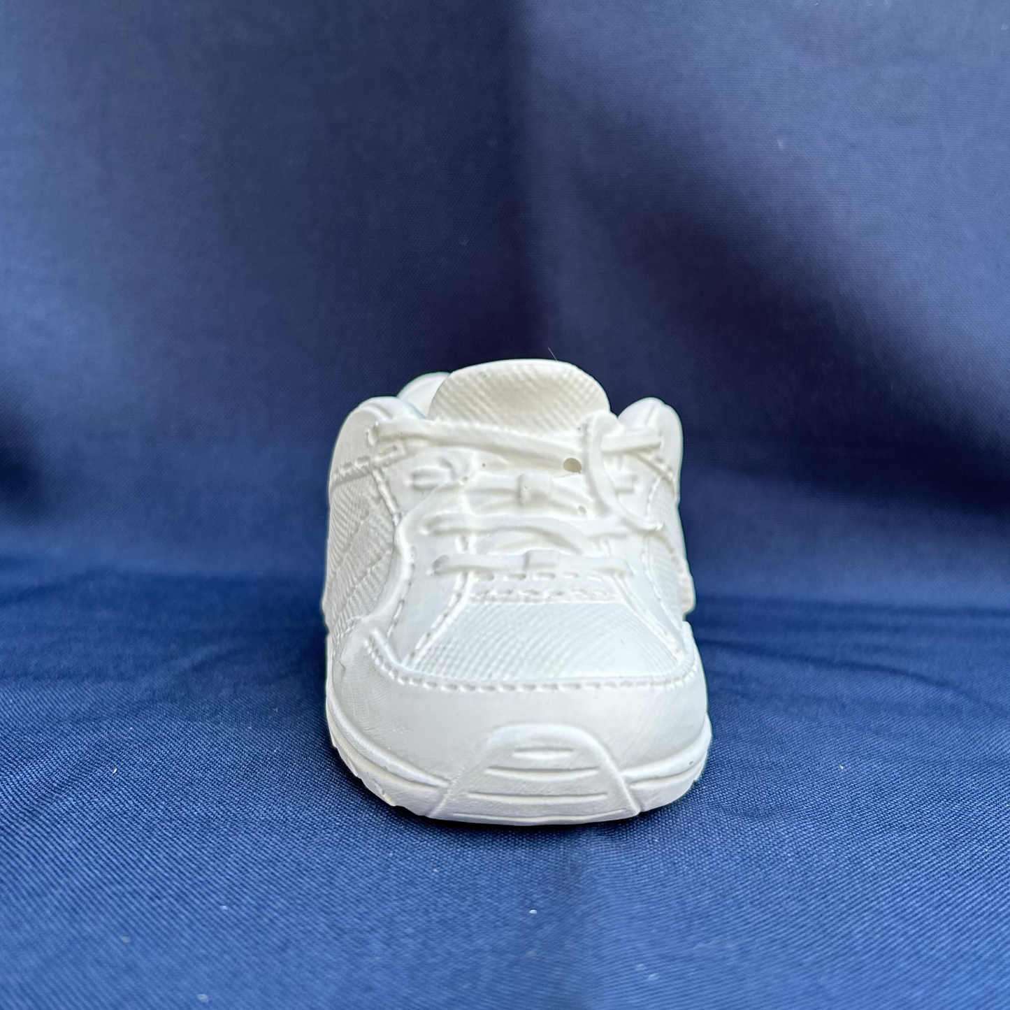 Dekorativer Babyschuh aus Keramik