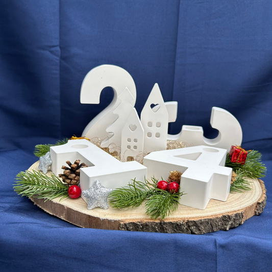 Adventskranz Häuser umgeben von großen Zahlen - Weihnachtsdeko