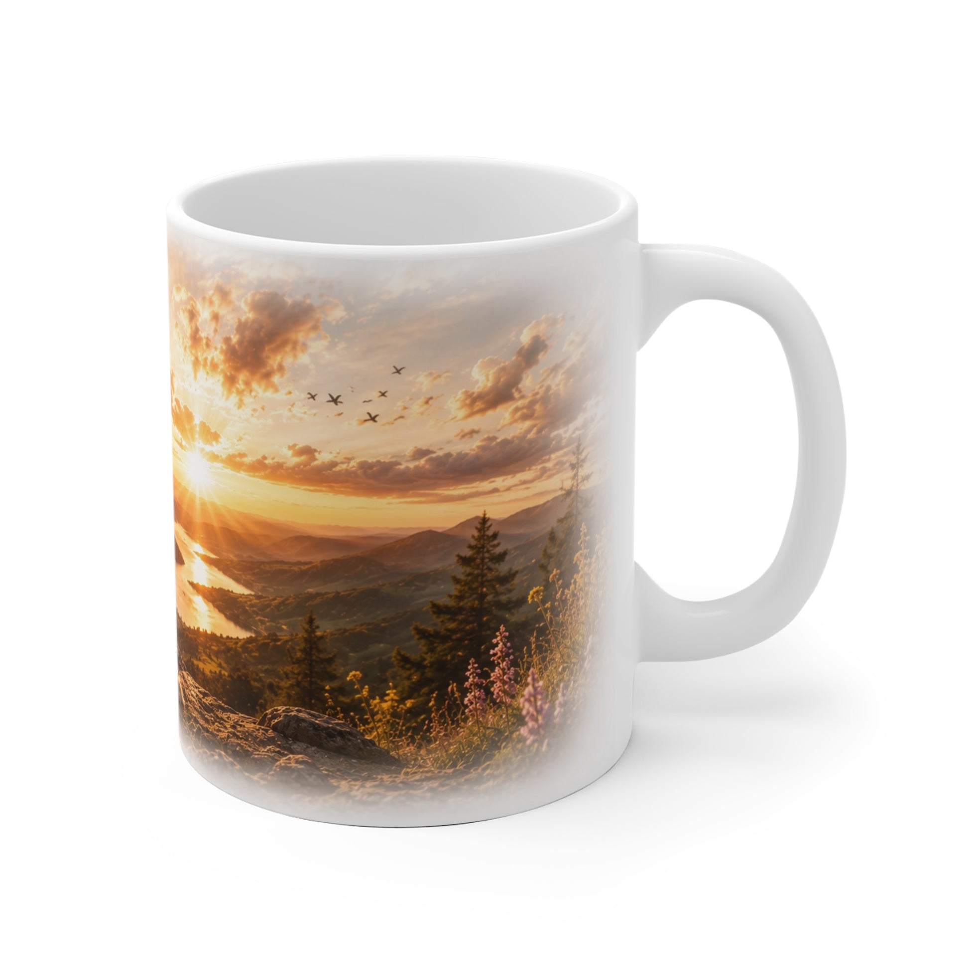 Motivtasse mit Berglandschaft, See, Sonnenuntergang, Vögeln und Wildblumen