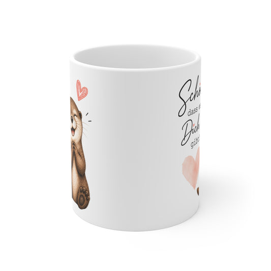 Rundum bedruckte Keramiktasse mit seitlich sichtbarem Ottermotiv, Herzsymbolen und Schriftzug auf weißem Hintergrund