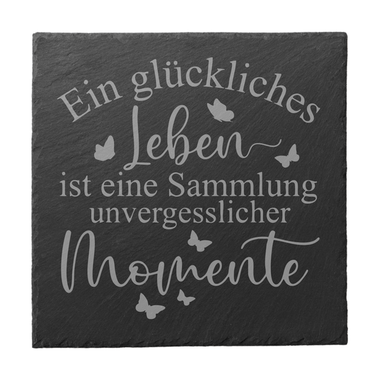Quadratischer schwarzer Schiefer-Untersetzer mit Gravur „Ein glückliches Leben ist eine Sammlung unvergesslicher Momente“