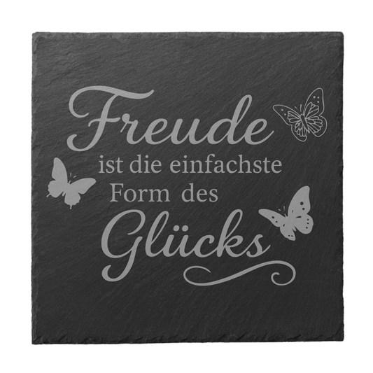Quadratischer schwarzer Schiefer-Untersetzer mit Gravur „Freude ist die einfachste Form des Glücks“ und Schmetterlingsmotiven