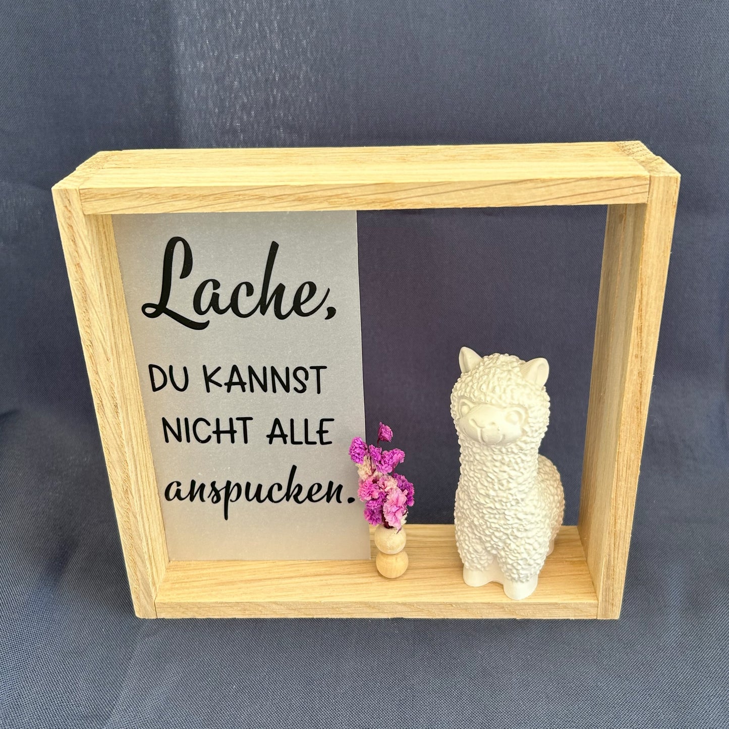 Holzrahmen - „Lache, du kannst nicht alle anspucken“