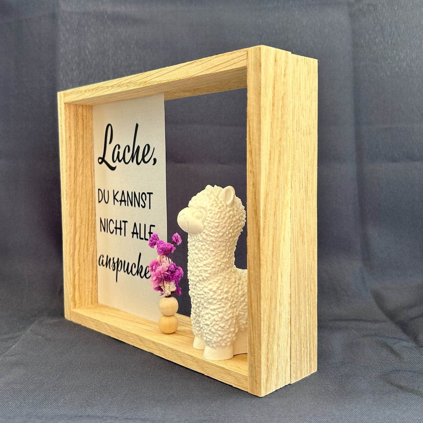 Holzrahmen - „Lache, du kannst nicht alle anspucken“