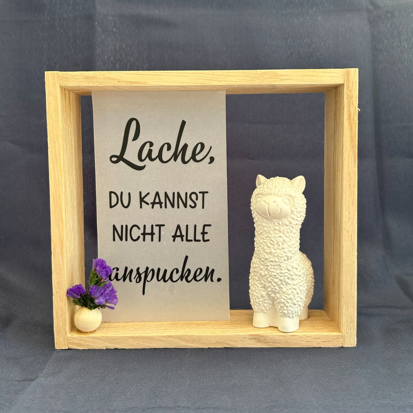 Holzrahmen - „Lache, du kannst nicht alle anspucken“