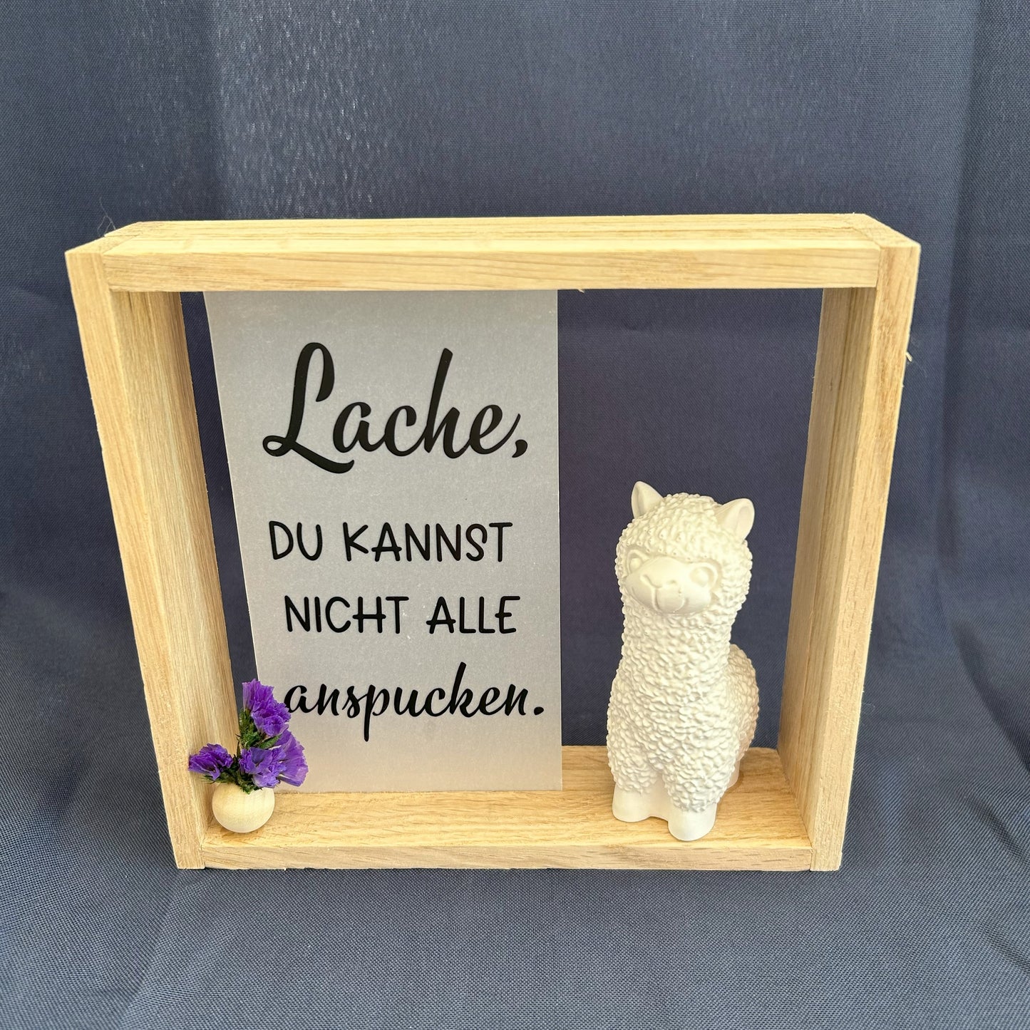 Holzrahmen - „Lache, du kannst nicht alle anspucken“