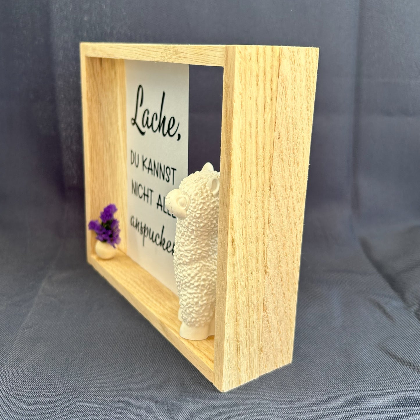 Holzrahmen - „Lache, du kannst nicht alle anspucken“