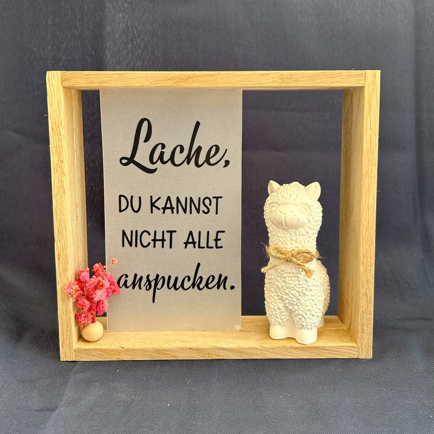 Holzrahmen - „Lache, du kannst nicht alle anspucken“