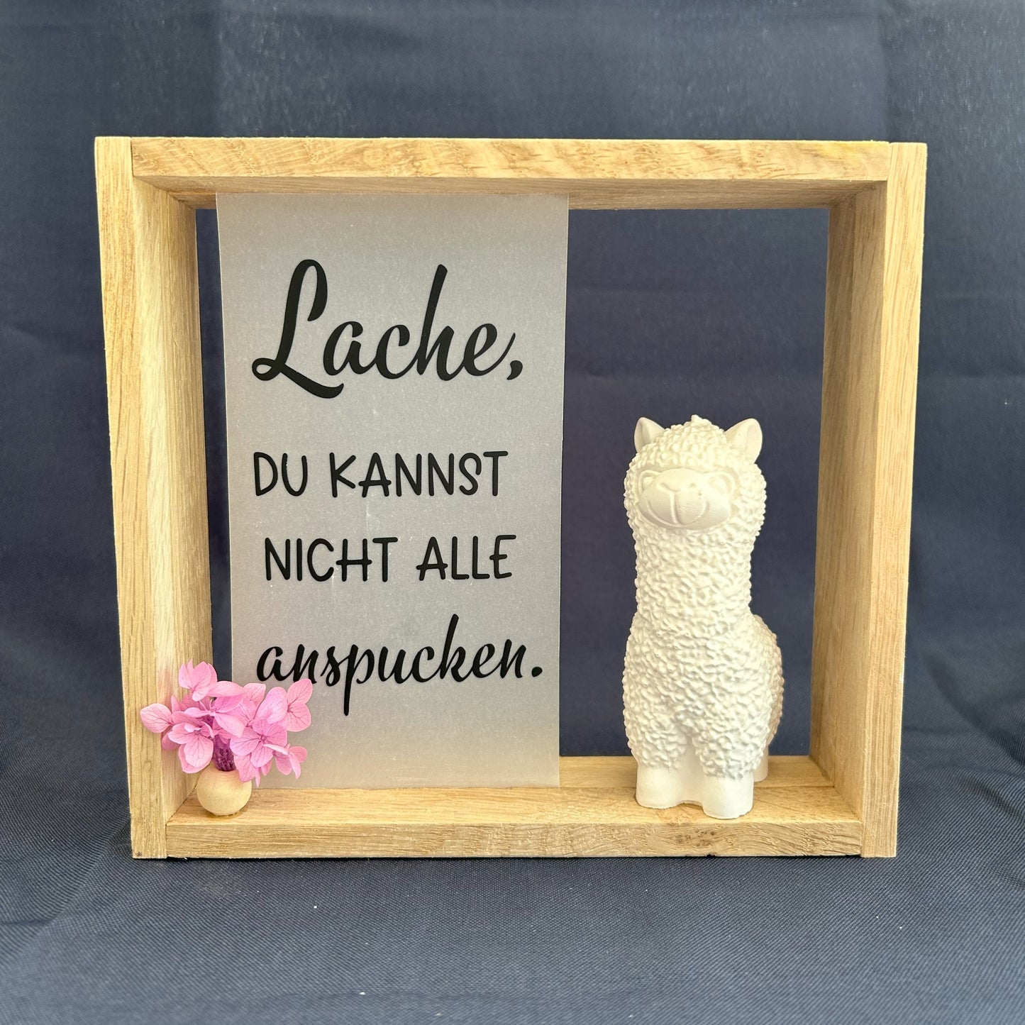 Holzrahmen - „Lache, du kannst nicht alle anspucken“