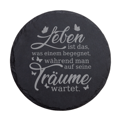 Runder schwarzer Schiefer-Untersetzer mit Motivationsspruch über Leben und Träume und Schmetterlingsmotiven