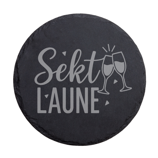 Runder schwarzer Schiefer-Untersetzer mit Schriftzug „Sektlaune“ und Sektglas Motiv
