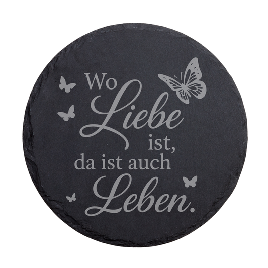 Runder schwarzer Schiefer-Untersetzer mit romantischem Spruch „Wo Liebe ist, da ist auch Leben“