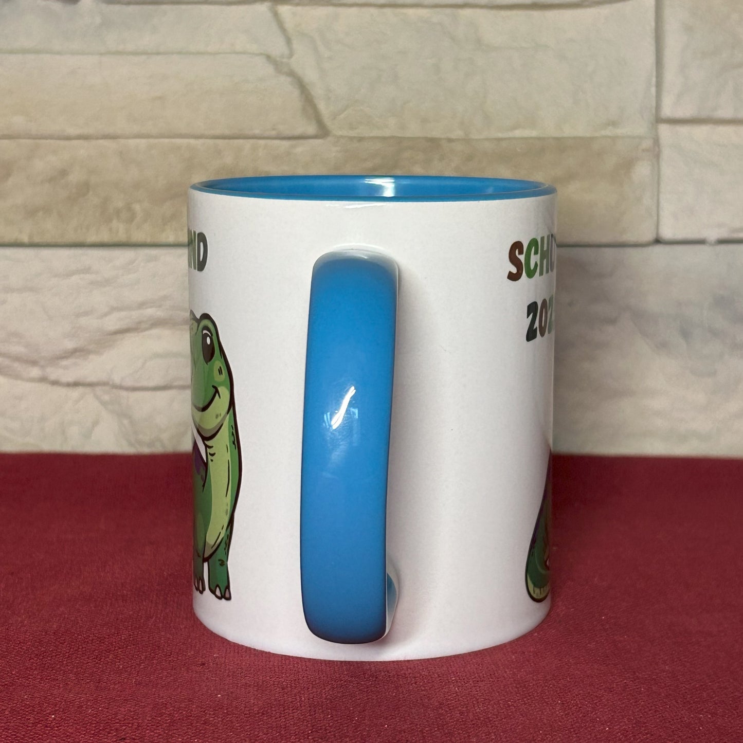 Tasse „Schulkind 2025“ - mit Dinosaurier
