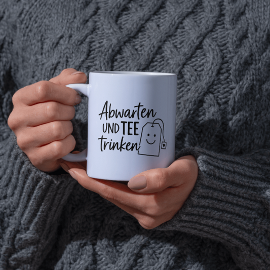 Tasse „Abwarten und Tee trinken“